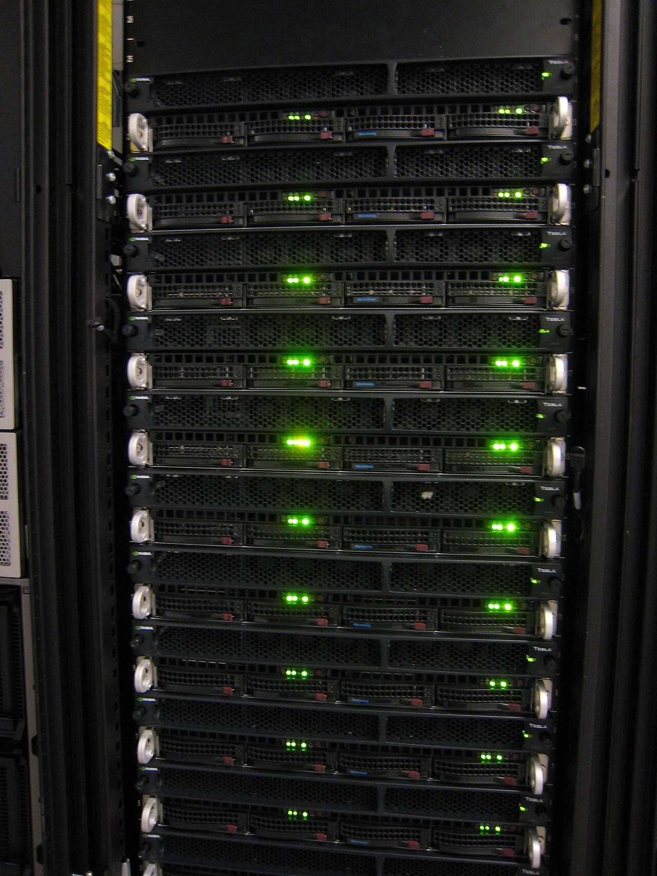Rack of GPU servers with status lights, used for model training and inference